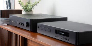 NAD C 359S integrated amplifier and C 569 CD player on a credenza