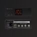 NuPrime SiGa Power75 power adapter on a dark background