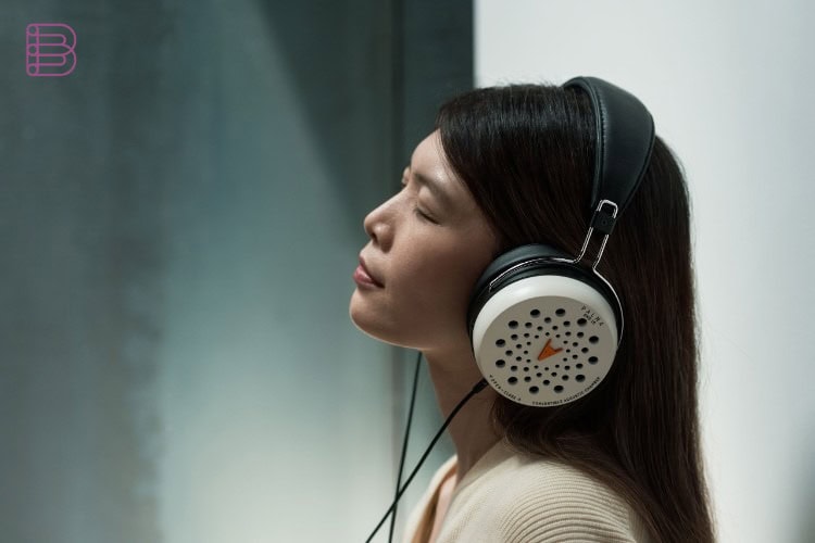 Woman wearing the white Palma DHS-10 convertible headphones