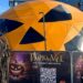 Orange jack-o-lantern-shaped geodesic dome exterior at Gunwharf Quays, Panasonic and Holovis Pumpkinville installation