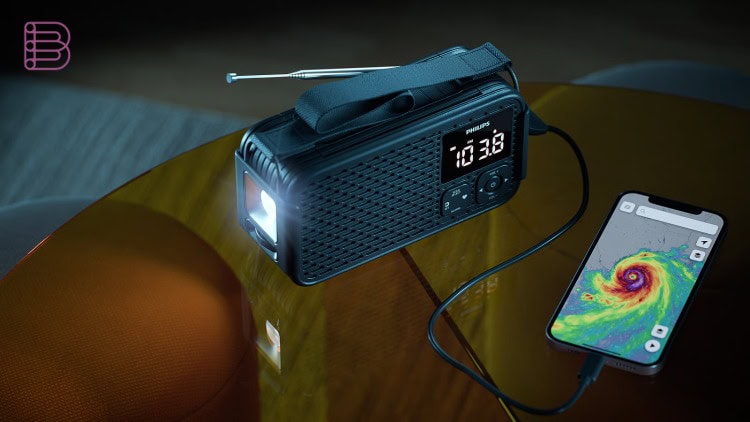 Philips TAR3500 emergency radio charging a smartphone via USB