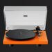 Pro-Ject Signal Orange Debut EVO 2 turntable on a dark background