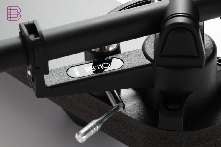 Close-up of the Rega Replay RB110 tonearm bearing housing