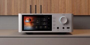 Shanling SM1.3R HD network streamer in silver on a sideboard