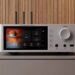 Shanling SM1.3R HD network streamer in silver on a sideboard