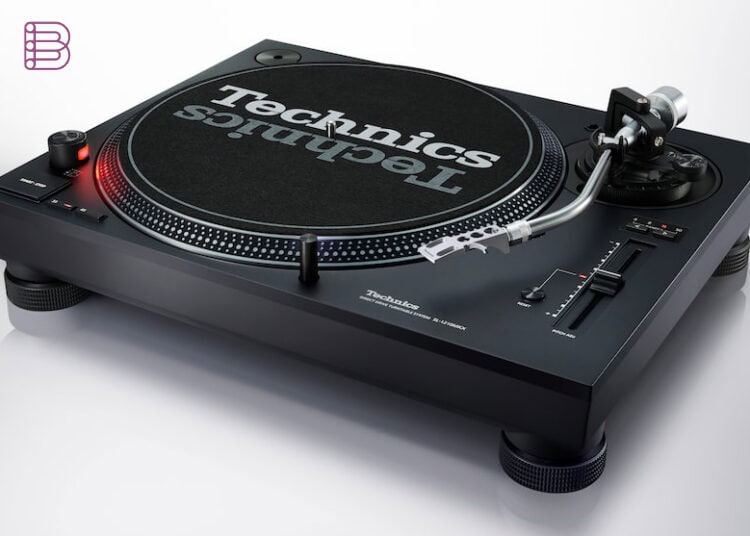 Technics SL-1210MKX direct-drive DJ turntable, angled view showing tonearm and pitch fader