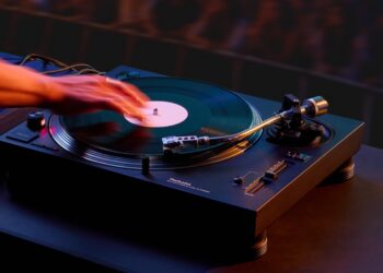 Technics SL-1210MKX professional direct-drive DJ turntable in a club environment